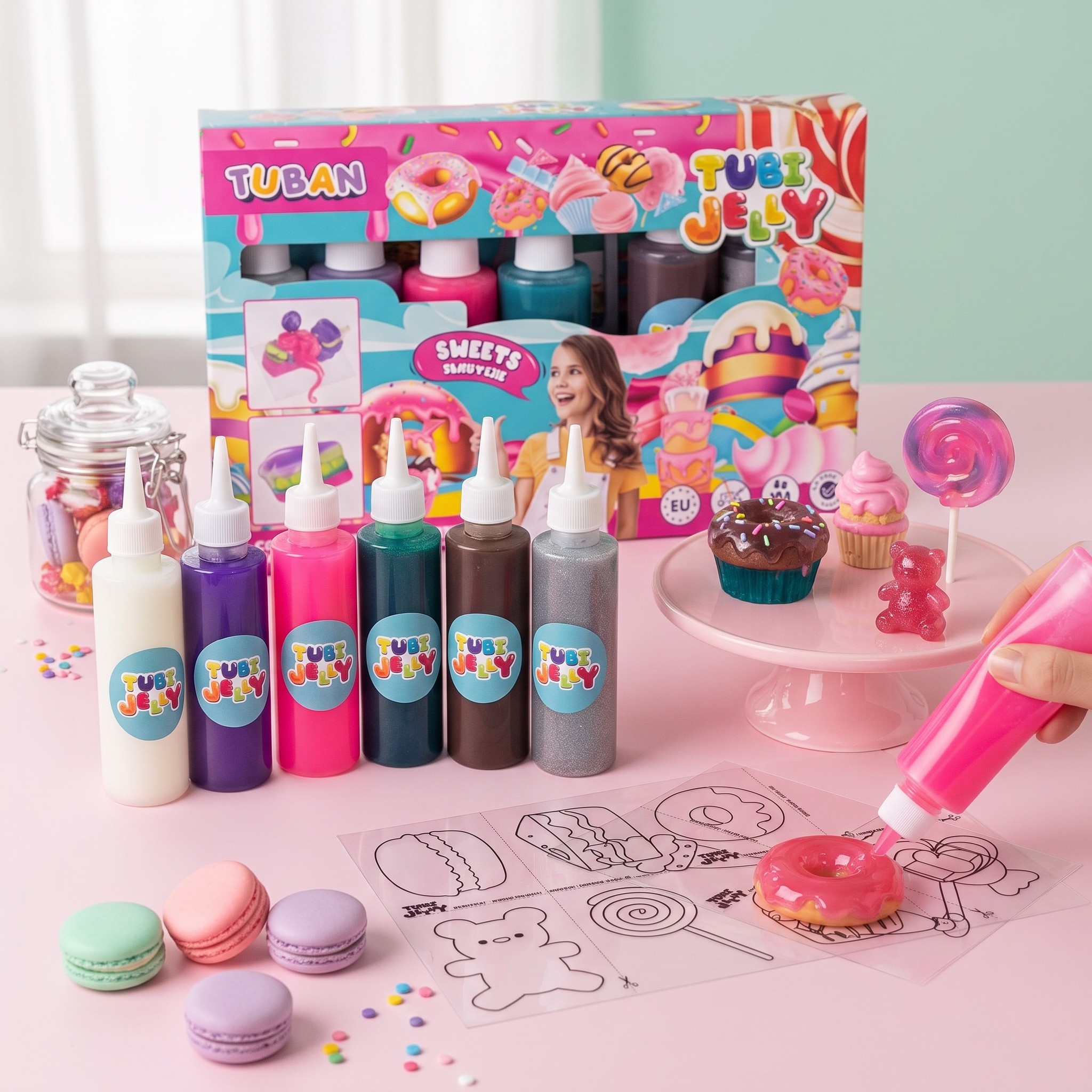 Tubi Jelly sweets gel craft kit on a pink table with six gel tubes, templates and finished gel figures such as a doughnut, lollipop and bear