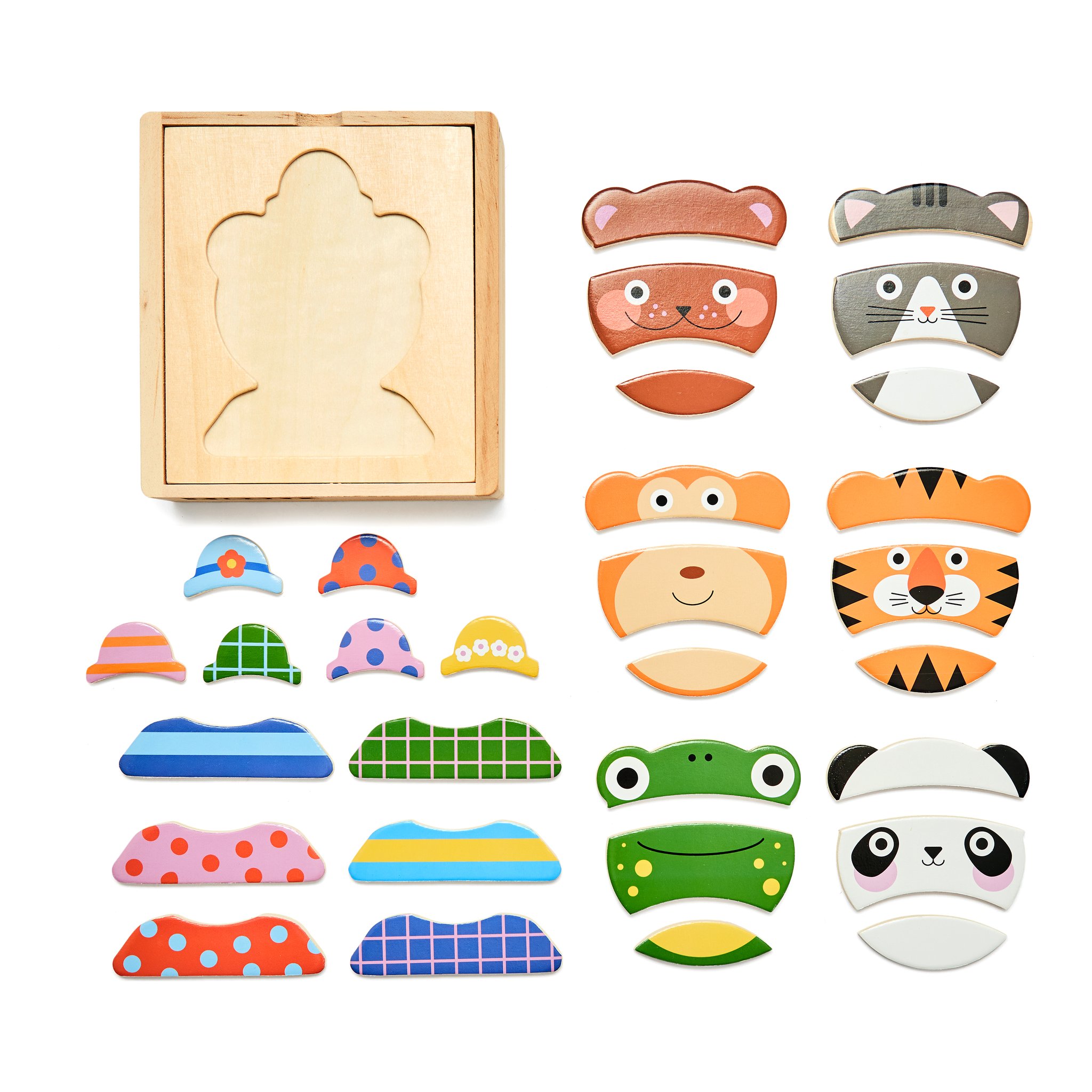 Plateau en bois et pièces de puzzle avec têtes, corps et pieds de six animaux