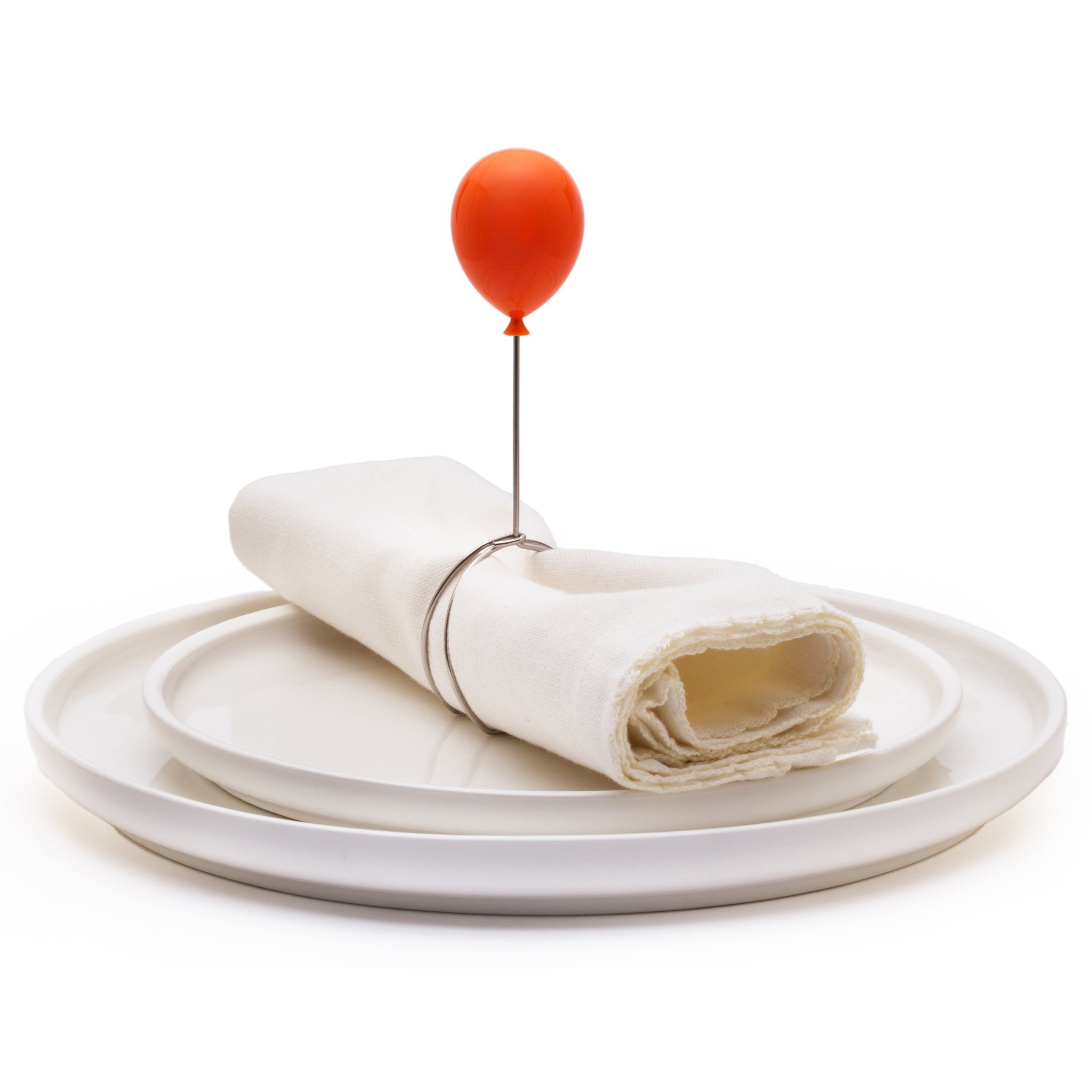 Napkin with a Balloonapkins ring on a plate