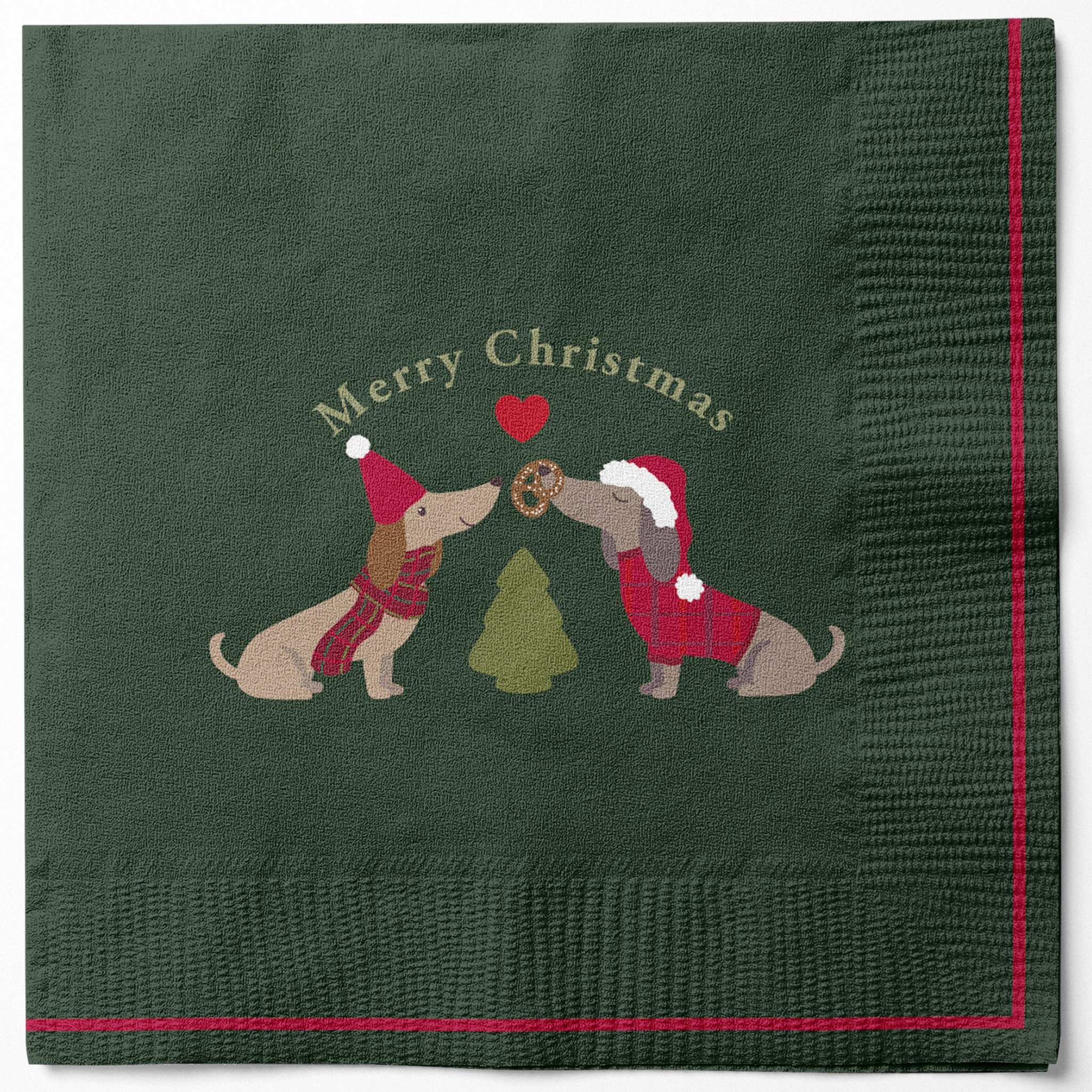 Grüne Papierserviette mit zwei Dackeln, Tannenbaum, Herz und Schriftzug Merry Christmas