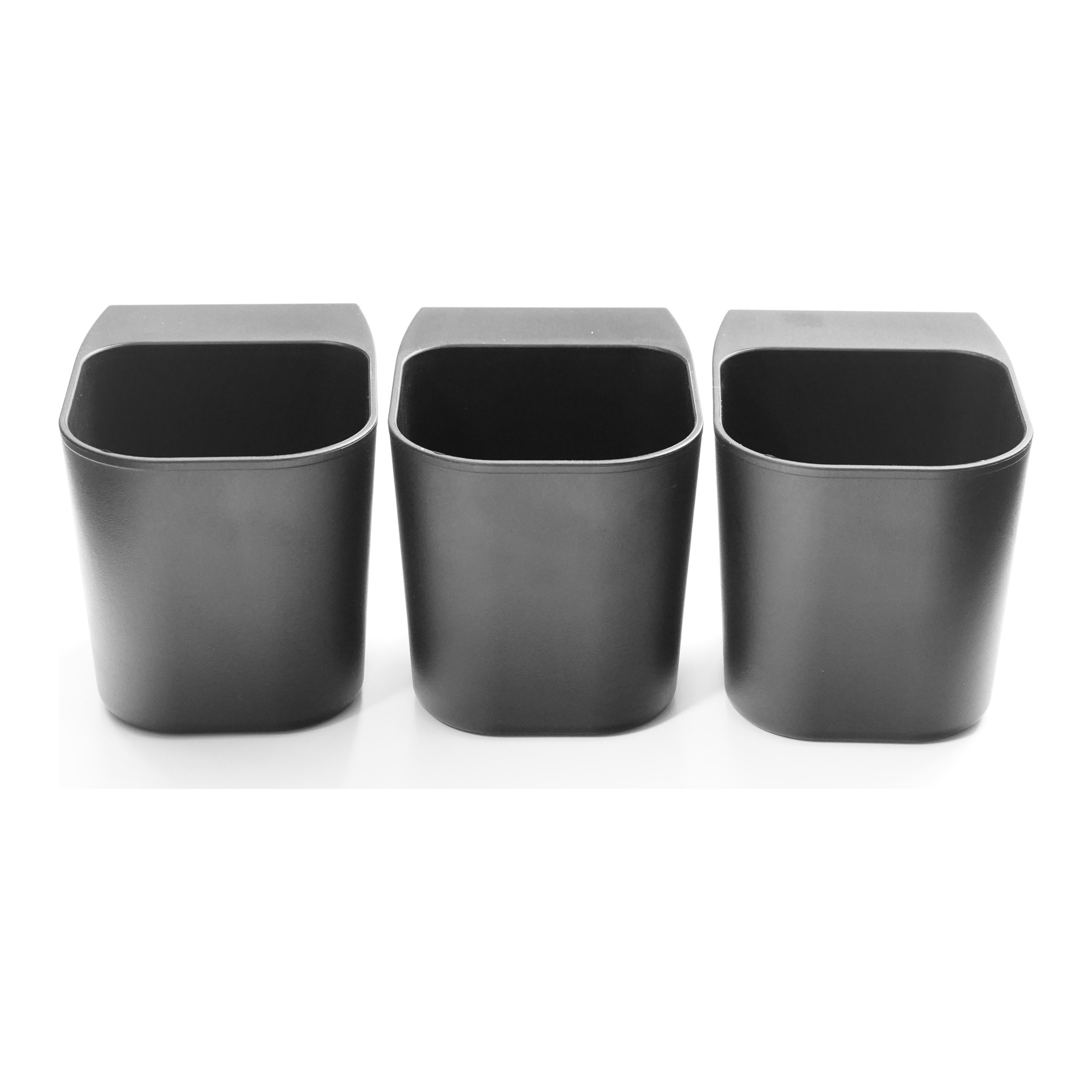Three black storage pots side by side