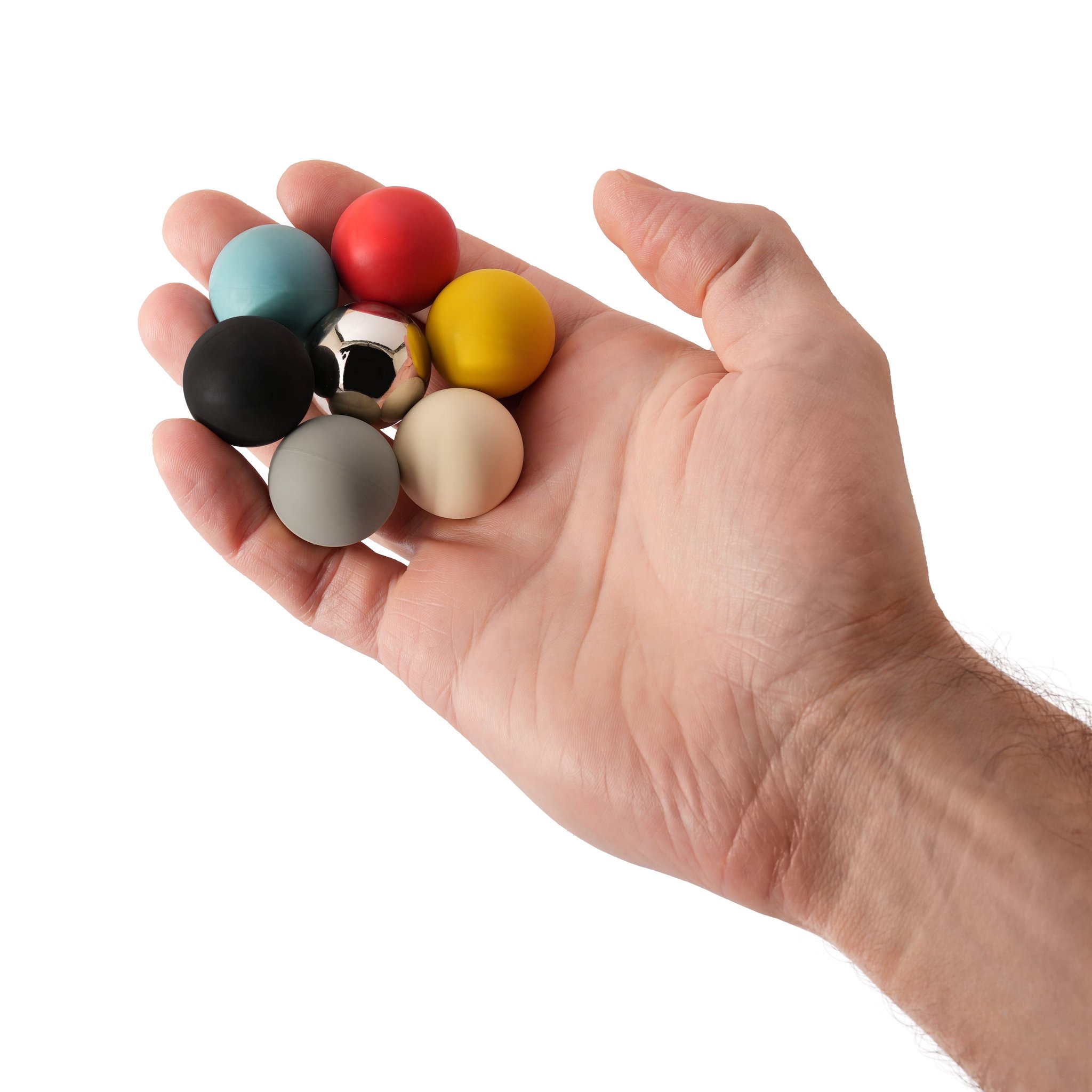 FLUXONS Kugeln in einer Handfläche, zeigt die Grösse