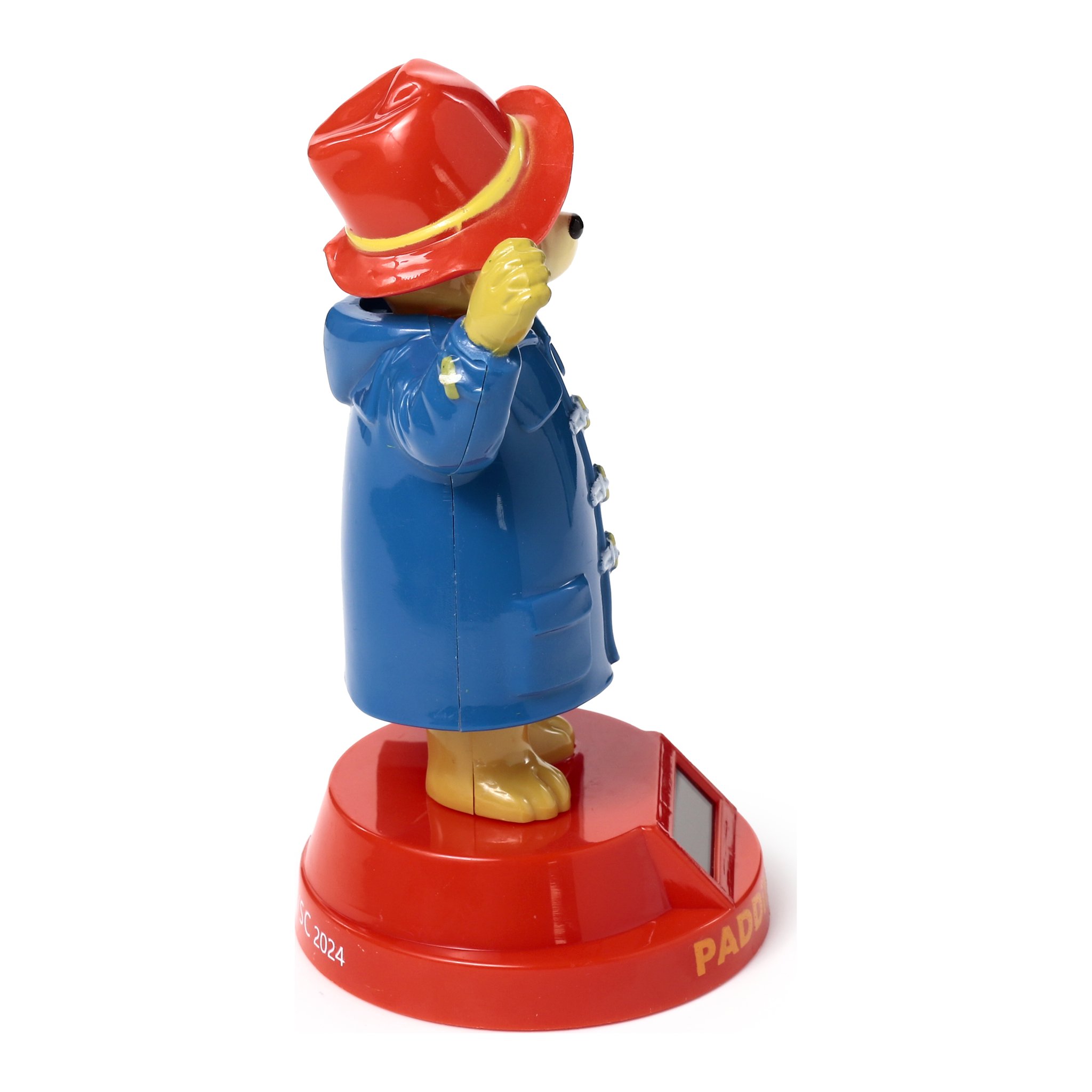 Paddington-Wackelfigur im Profil auf rotem Solarsockel