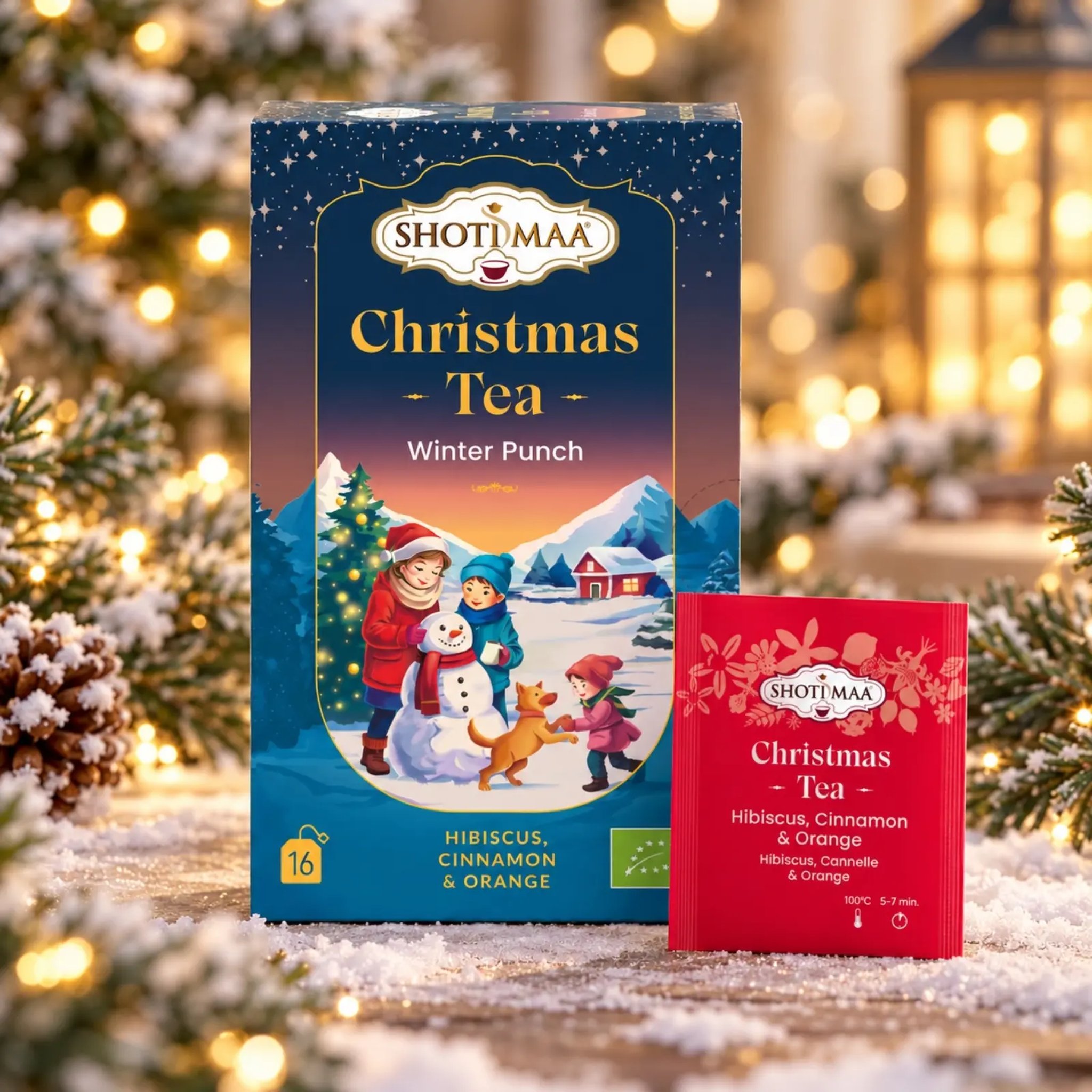 Christmas tea box with an individually wrapped red tea bag in the snow
