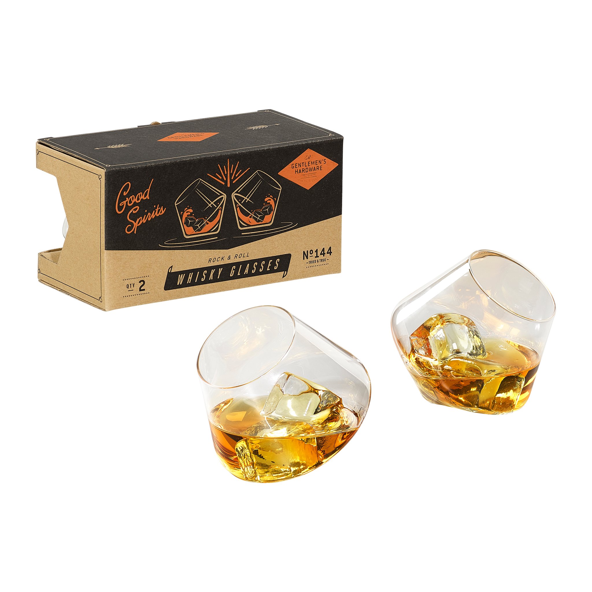 Tilted Rocking Whisky Glasses with whisky and ice in front of the cardboard box with its retro print