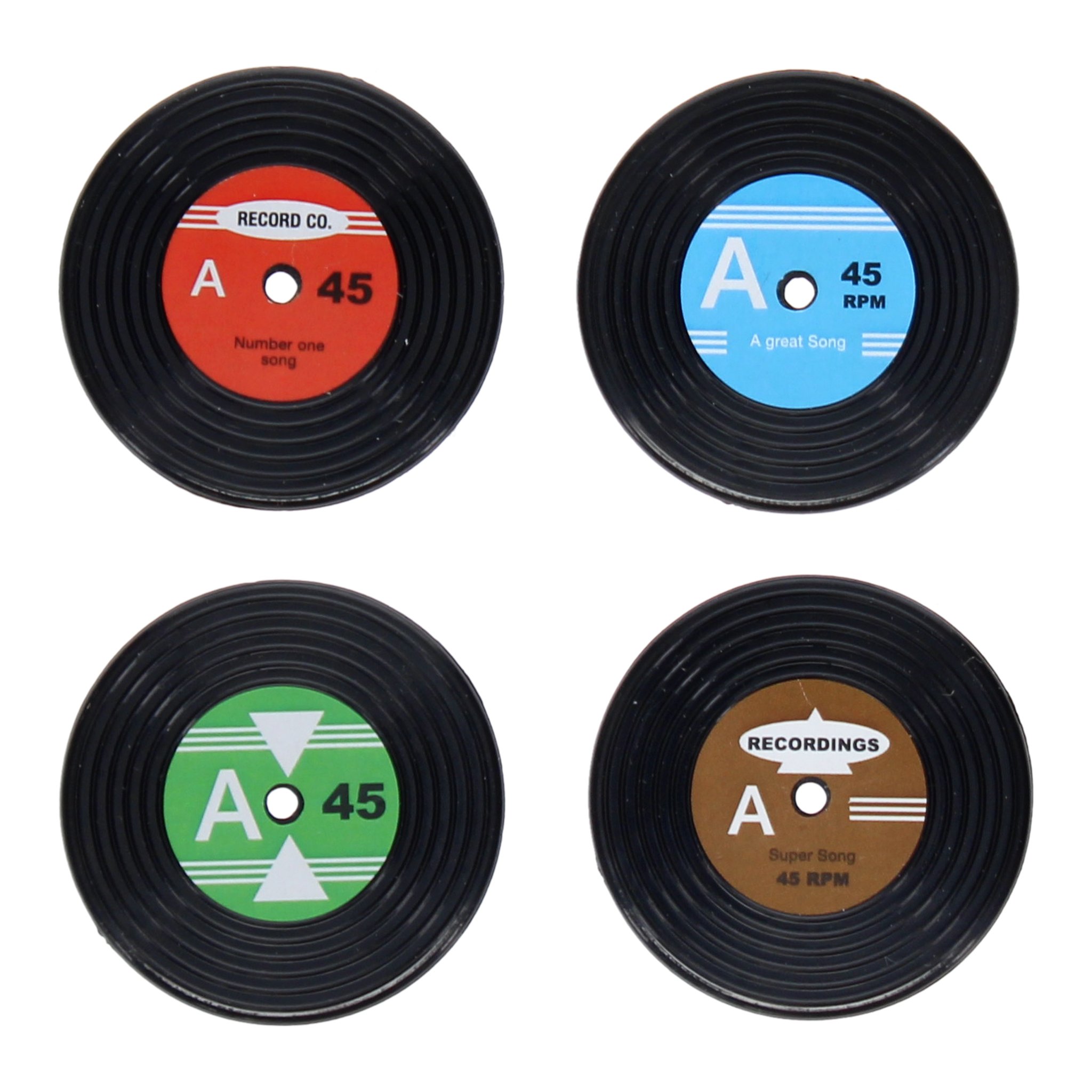 Die vier Schallplatten-Magnete mit roten, blauen, grünen und braunen Labels