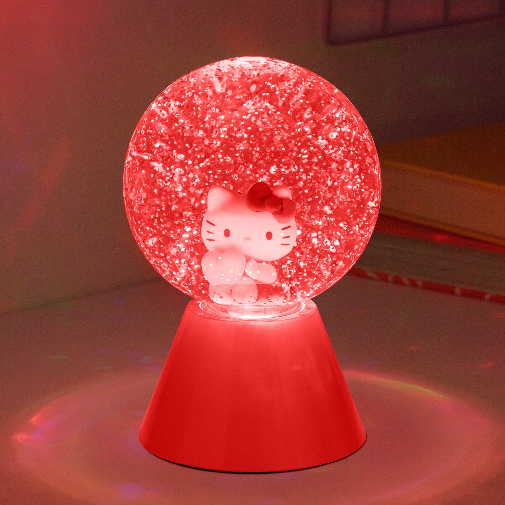 Glitzerkugel leuchtet rot