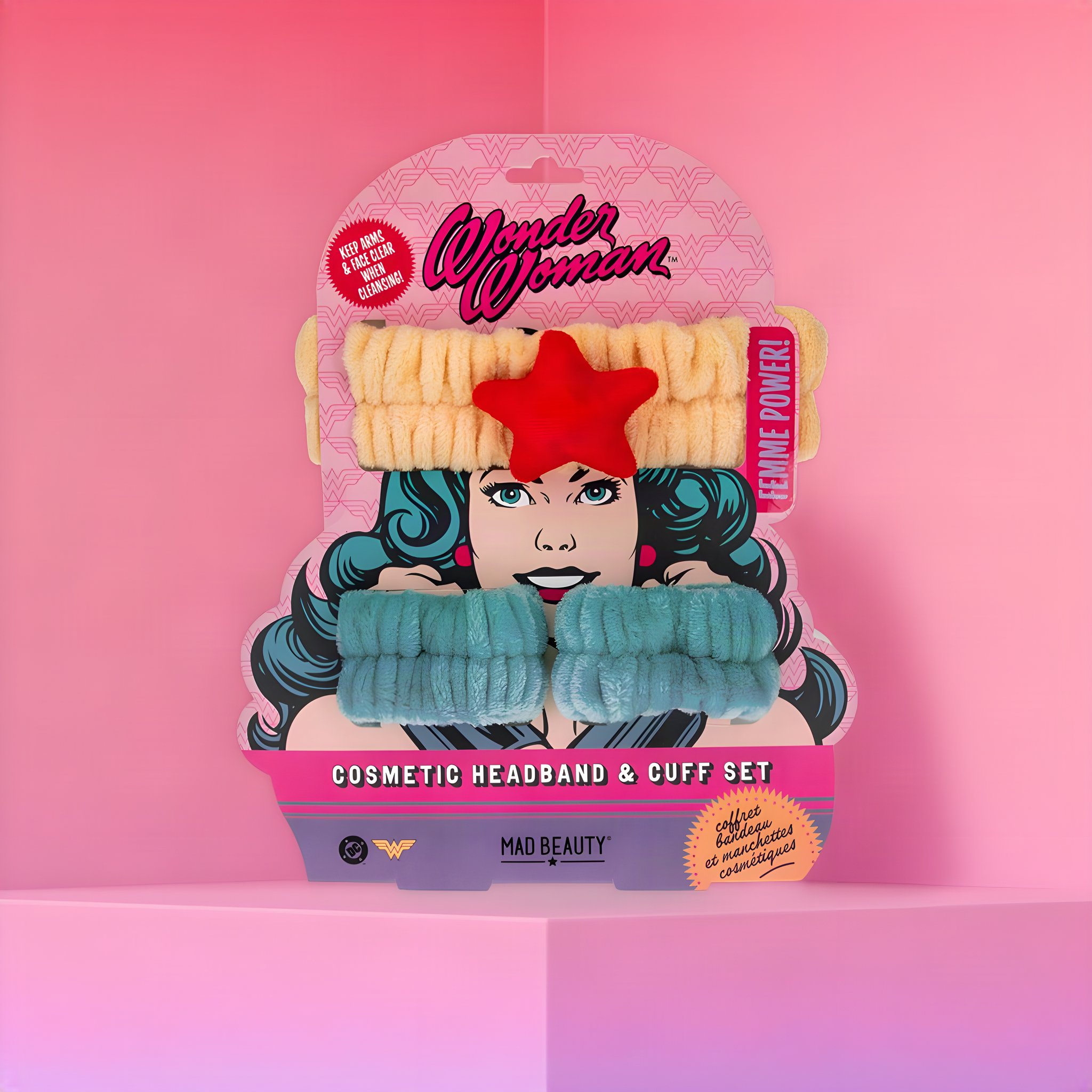 Wonder Woman Kosmetik-Stirnband mit rotem Stern und zwei Frottee-Manschetten auf der Comic-Karte, rosa Hintergrund