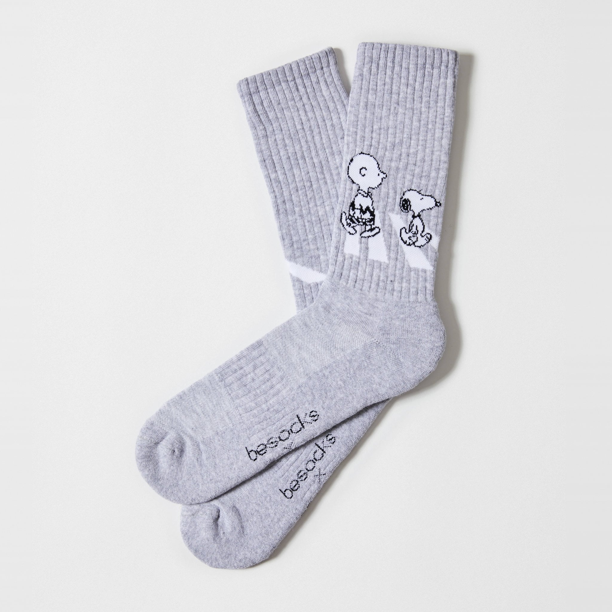 Grey marl socks with Charlie Brown and Snoopy at the cuff from the Snoopy Street socks set
