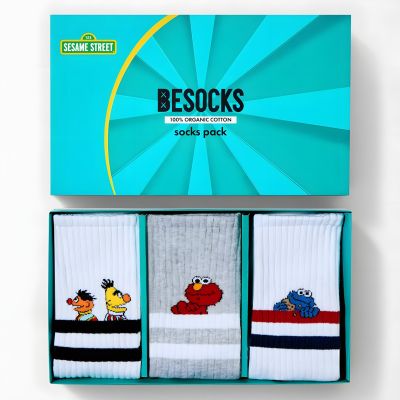 Set regalo calzini Sesame Street uomo: scatola turchese aperta con tre paia – Ernie & Bert, Elmo, Cookie Monster